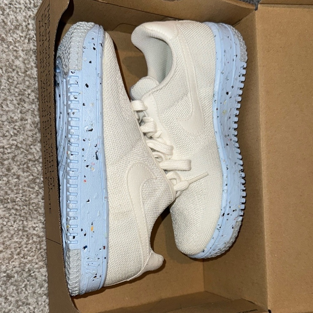 White Sneakers with Light Blue Speckled Soles